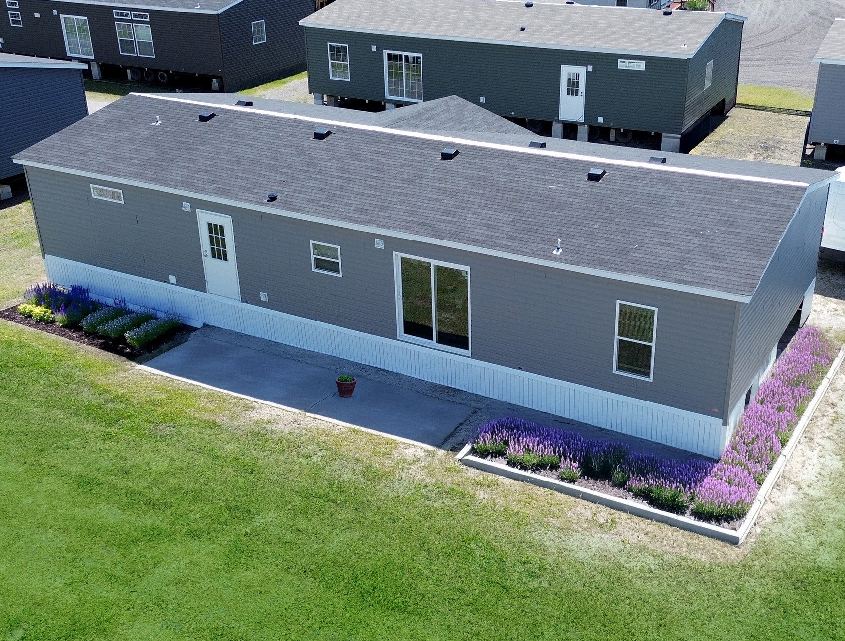 mobile home with valor vinyl skirting - drone shot copy mobile home with valor vinyl skirting - drone shot copy